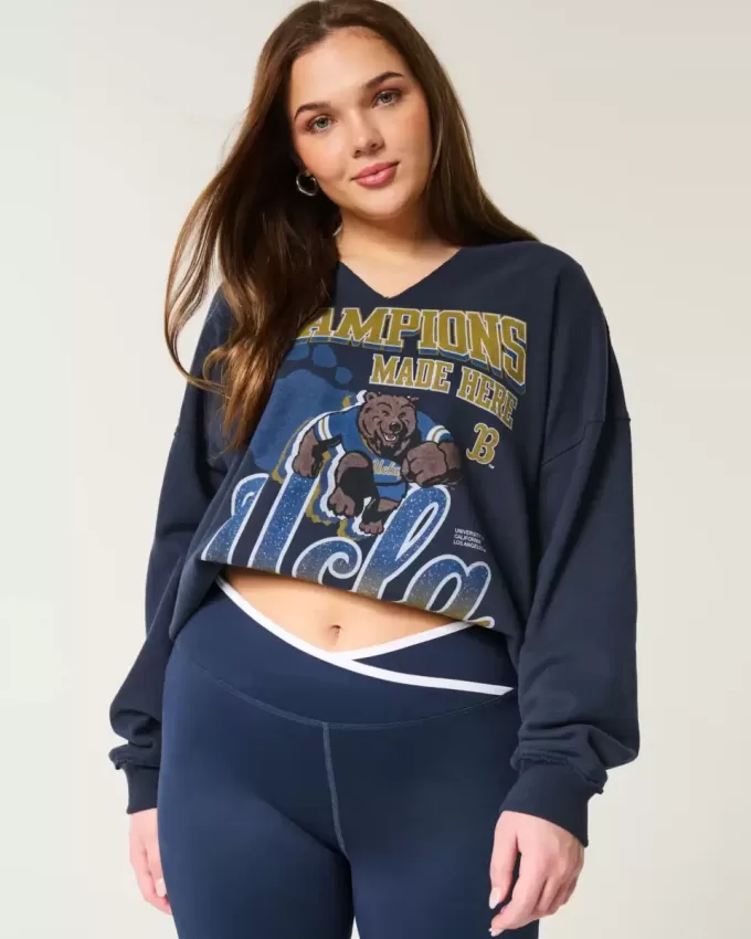 Felpa oversize con scollo a V e grafica UCLA
