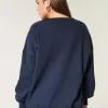 Felpa oversize con scollo a V e grafica UCLA