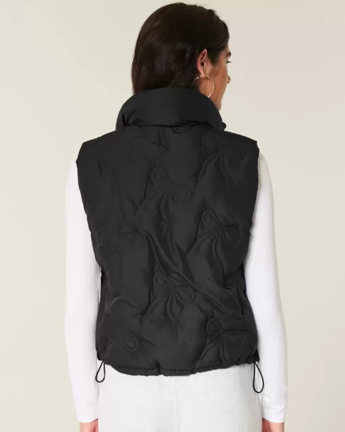 Gilet imbottito con motivo a fiocco