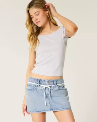Gonna-pantalone corta in denim con lacci e lavaggio chiaro a vita bassa