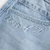 Gonna-pantalone in denim a vita bassa della classe del ’26