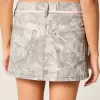 Gonna-pantalone mimetica con lacci rosa a vita bassa