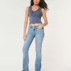 Jeans a vita bassa con lavaggio chiaro