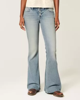 Jeans a zampa a lavaggio medio e vita ultra bassa
