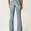 Jeans a zampa a lavaggio medio e vita ultra bassa