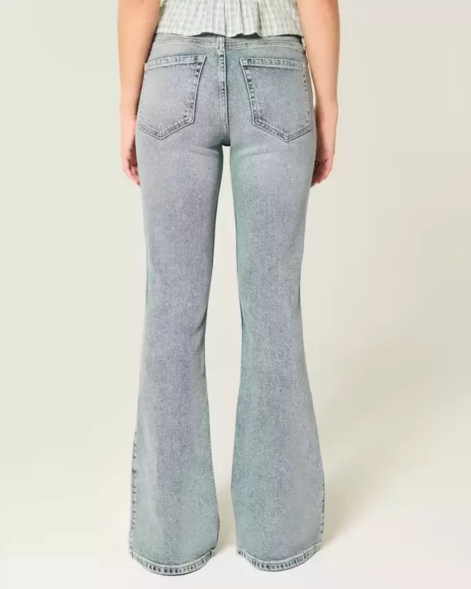 Jeans a zampa a vita alta con lavaggio medio