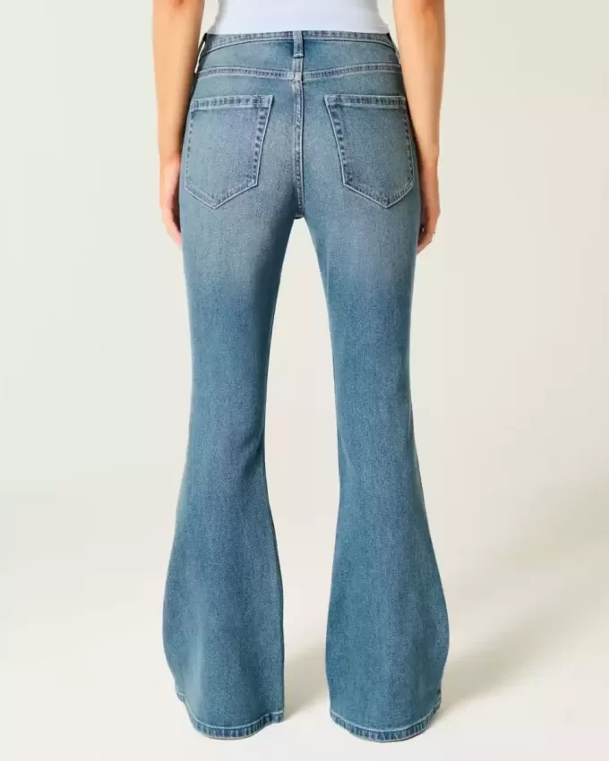 Jeans a zampa a vita alta con lavaggio medio