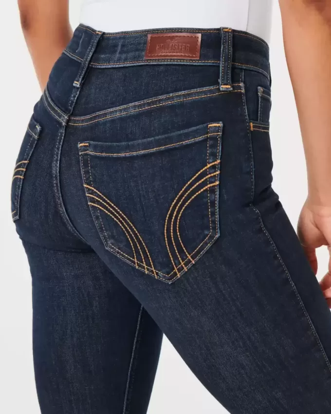 Jeans a zampa a vita alta con lavaggio scuro