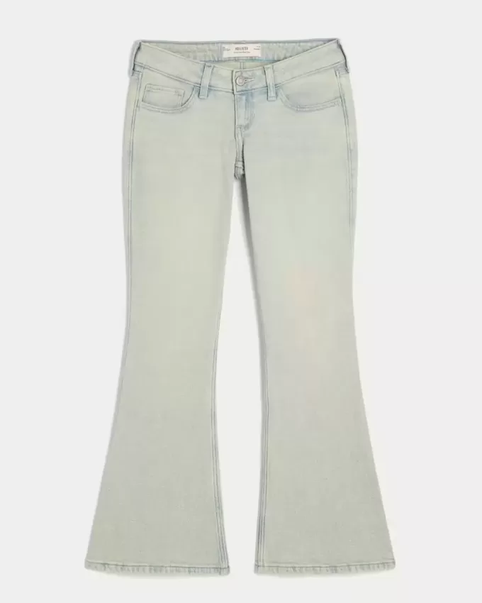 Jeans a zampa a vita bassissima e lavaggio chiaro