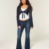 Jeans a zampa a vita bassissima lavaggio scuro
