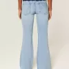 Jeans a zampa con paillettes lavaggio chiaro e vita ultra bassa effetto consumato