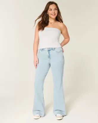 Jeans a zampa con ricamo a cuore e lavaggio chiaro a vita alta