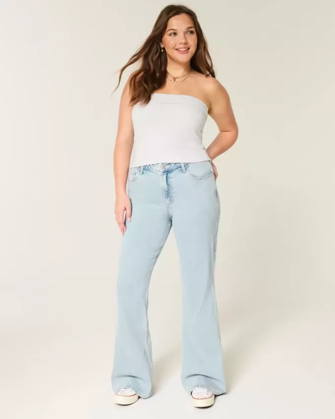 Jeans a zampa con ricamo a cuore e lavaggio chiaro a vita alta