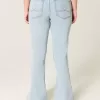 Jeans a zampa con ricamo a cuore e lavaggio chiaro a vita alta