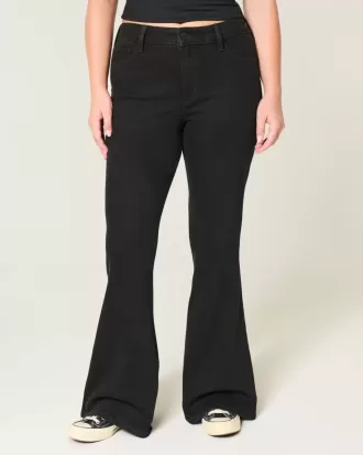 Jeans a zampa neri a vita alta