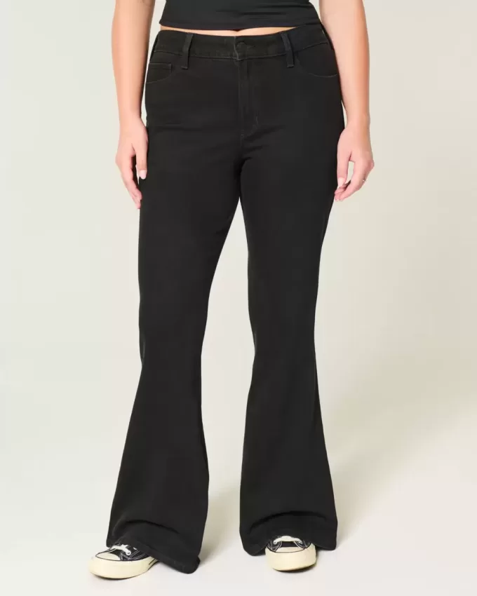 Jeans a zampa neri a vita alta