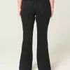 Jeans a zampa neri a vita alta