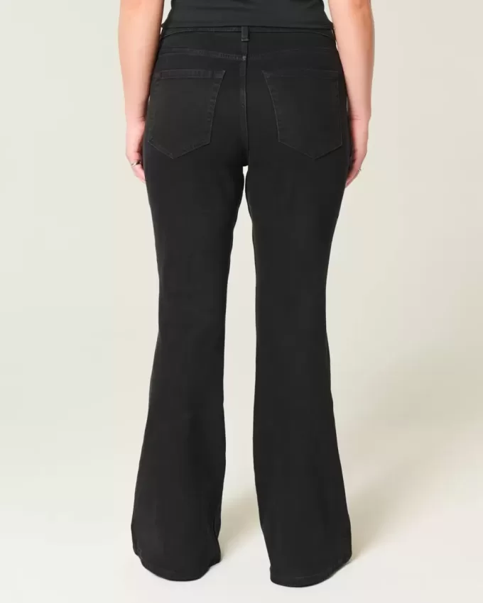 Jeans a zampa neri a vita alta