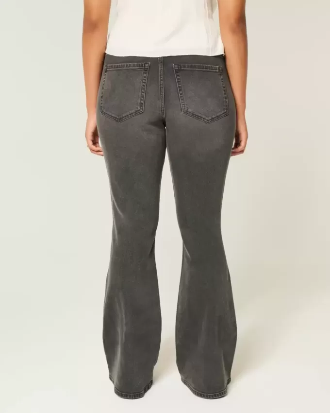 Jeans a zampa ricamati neri lavati a vita alta