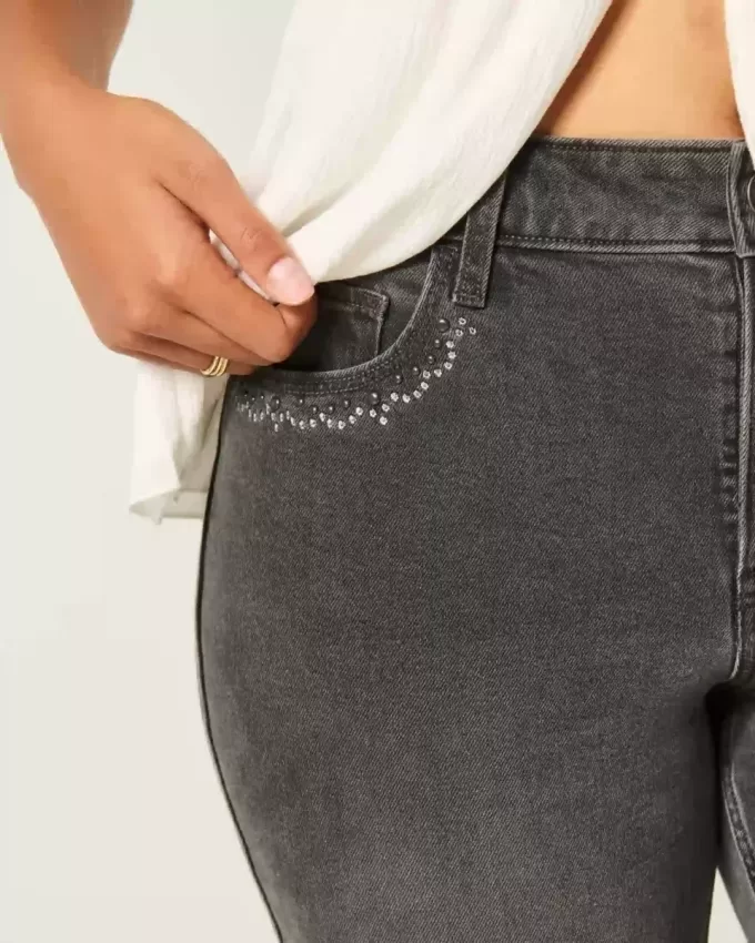 Jeans a zampa ricamati neri lavati a vita alta