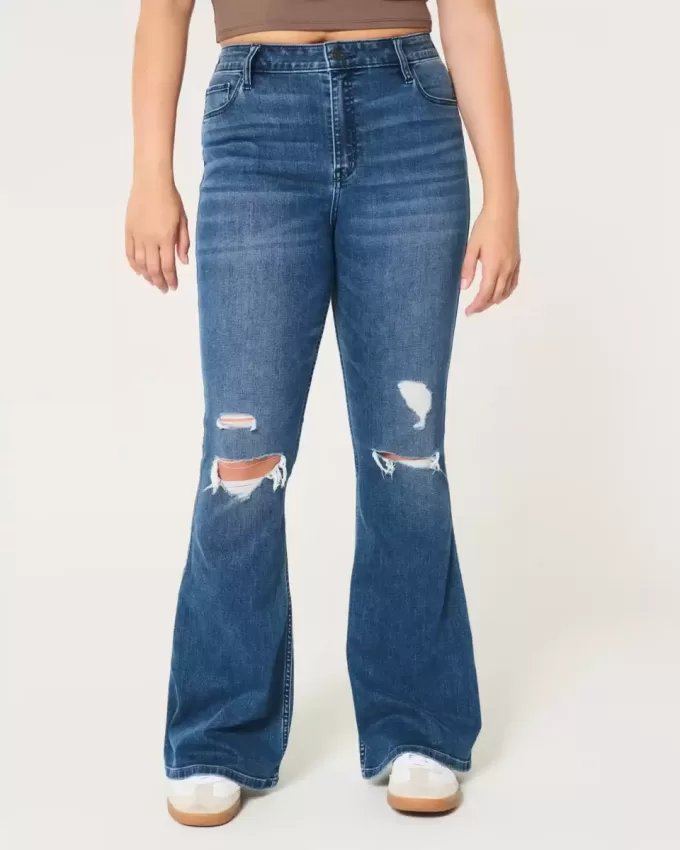Jeans a zampa strappati a vita alta con lavaggio medio