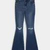 Jeans a zampa strappati a vita alta con lavaggio medio