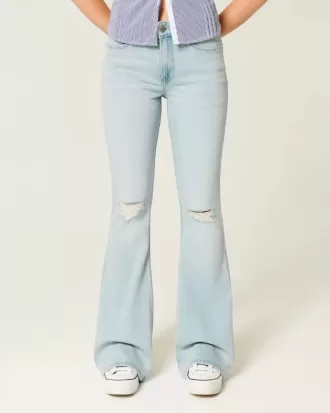 Jeans a zampa strappati a vita alta e lavaggio chiaro