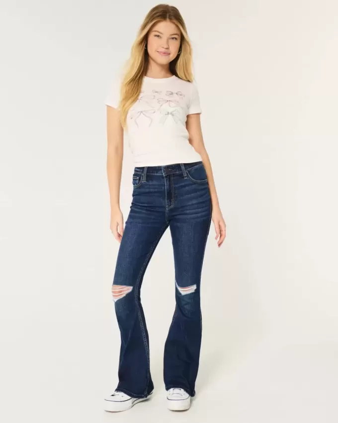 Jeans a zampa strappati a vita alta e lavaggio scuro
