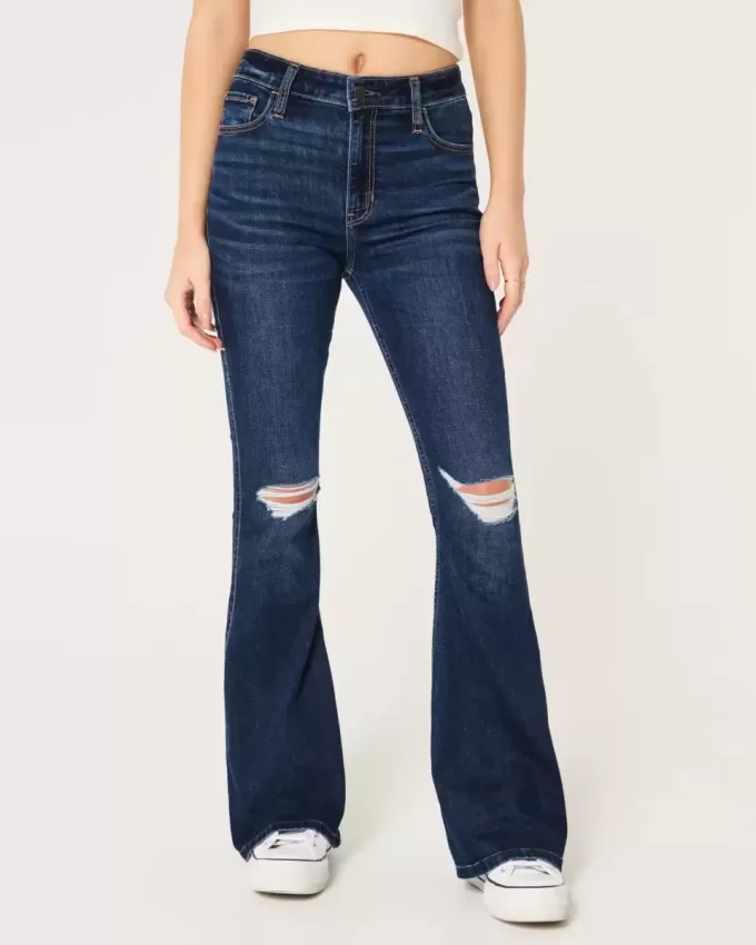 Jeans a zampa strappati a vita alta e lavaggio scuro