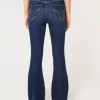 Jeans a zampa strappati a vita alta e lavaggio scuro