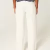 Jeans bianchi larghi a vita bassa