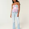Jeans bootcut a vita bassa con lavaggio chiaro