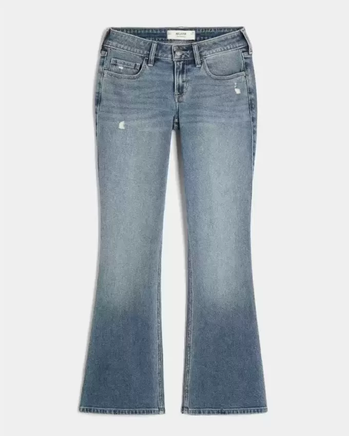 Jeans bootcut a vita bassa con lavaggio medio effetto consumato