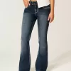 Jeans bootcut a vita bassa con lavaggio scuro Jeans bootcut a vita bassa con lavaggio scuro