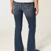 Jeans bootcut a vita bassa con lavaggio scuro Jeans bootcut a vita bassa con lavaggio scuro