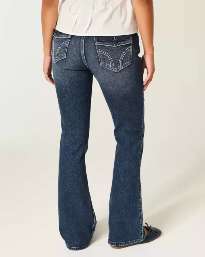 Jeans bootcut a vita bassa con lavaggio scuro Jeans bootcut a vita bassa con lavaggio scuro