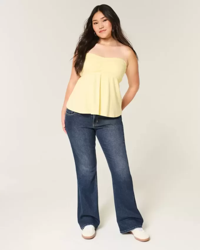 Jeans bootcut a vita bassa con lavaggio scuro Jeans bootcut a vita bassa con lavaggio scuro