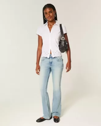 Jeans bootcut a vita bassa con ricamo a farfalla e lavaggio medio