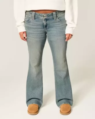 Jeans bootcut a vita bassa con ricamo a farfalla e lavaggio medio