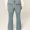 Jeans bootcut a vita bassa con ricamo a farfalla e lavaggio medio