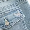 Jeans bootcut a vita bassa con ricamo a farfalla e lavaggio medio