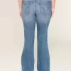 Jeans bootcut a vita bassa con strappi e lavaggio medio
