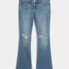 Jeans bootcut a vita bassa con strappi e lavaggio medio