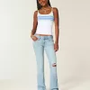 Jeans bootcut a vita bassa, strappati, lavaggio chiaro e ricamati