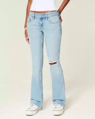 Jeans bootcut a vita bassa, strappati, lavaggio chiaro e ricamati