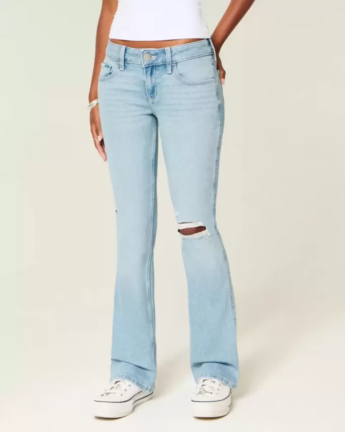 Jeans bootcut a vita bassa, strappati, lavaggio chiaro e ricamati