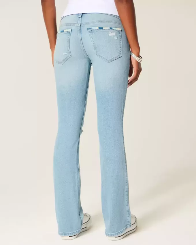 Jeans bootcut a vita bassa, strappati, lavaggio chiaro e ricamati