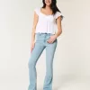 Jeans bootcut lavaggio chiaro a vita media