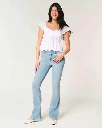 Jeans bootcut lavaggio chiaro a vita media