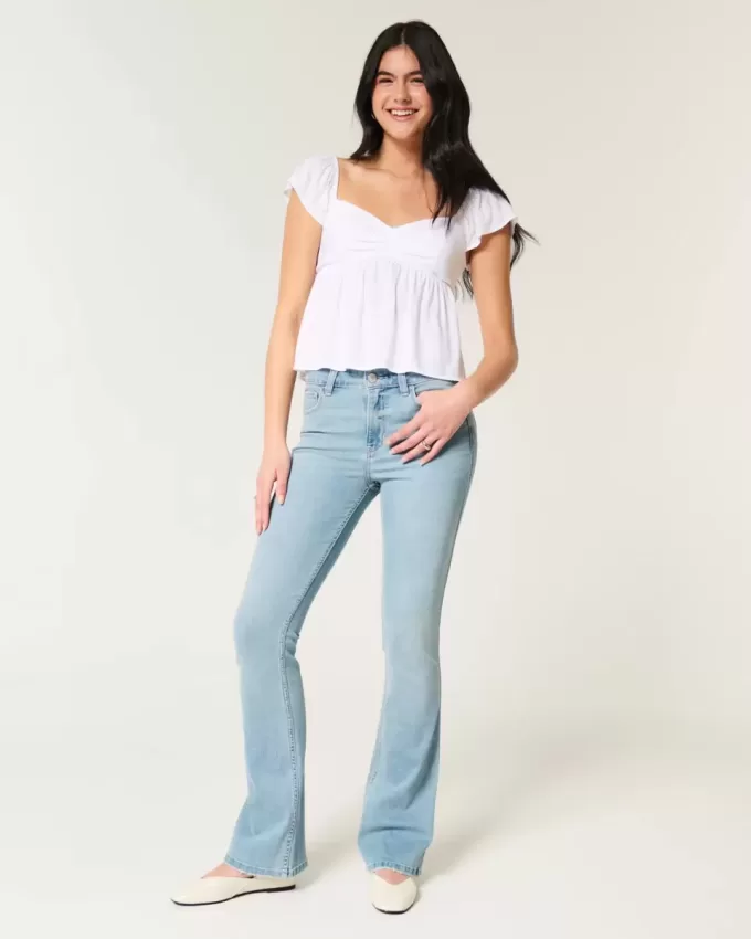Jeans bootcut lavaggio chiaro a vita media